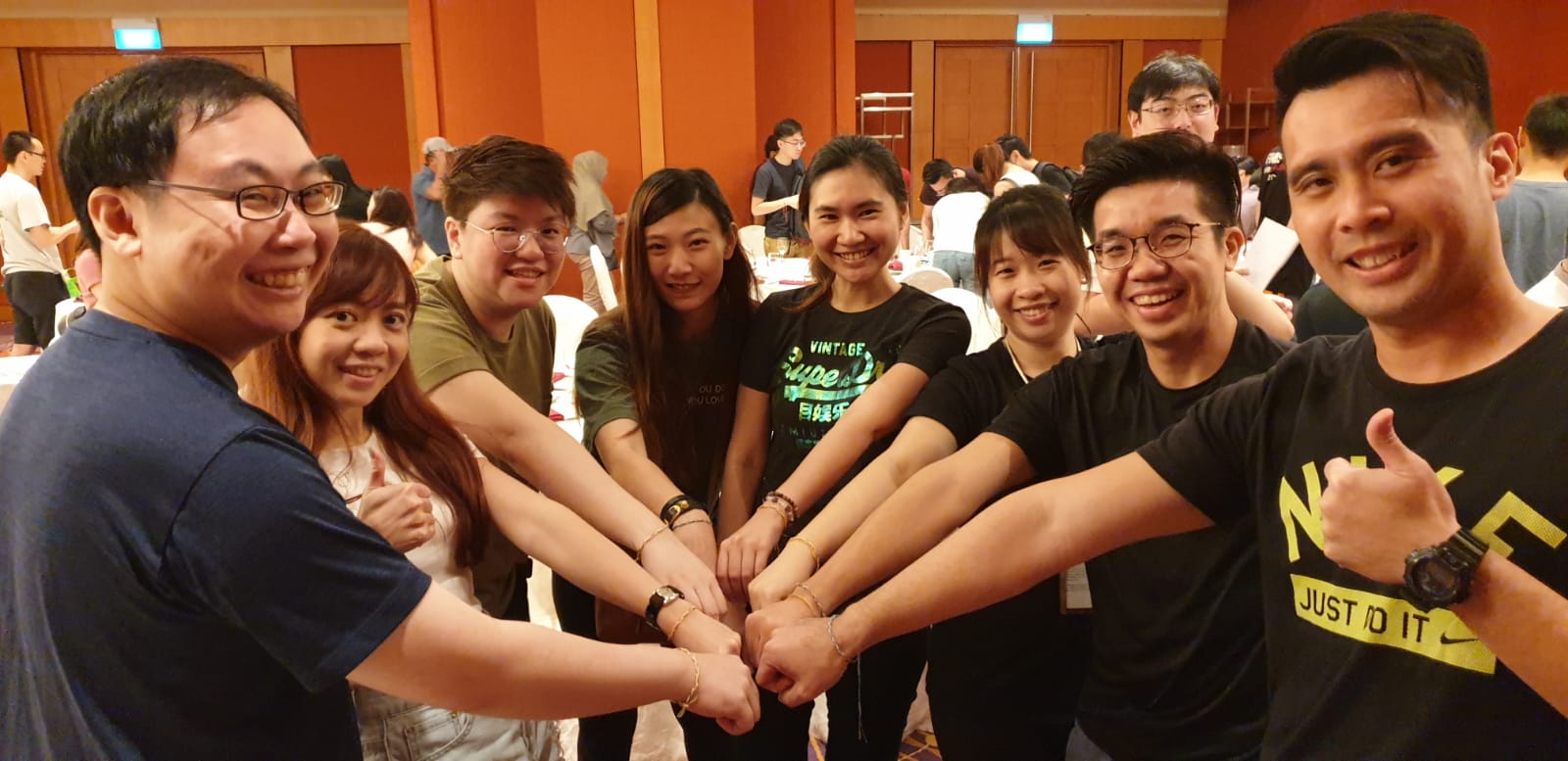 Indoor team building activity participants in Singapore